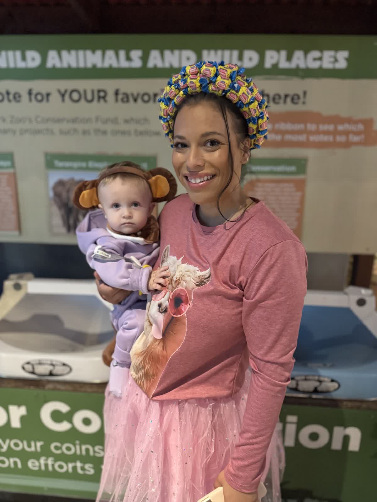Ben’s wife holding their son during a family day out